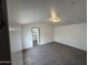 Bedroom featuring neutral carpet and a view of the adjacent bathroom at 625 W Mckellips Rd # 236, Mesa, AZ 85201
