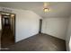 Bedroom featuring neutral colored walls, plush carpeted floor and a hall walk-through at 625 W Mckellips Rd # 236, Mesa, AZ 85201