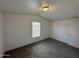Bright bedroom features vaulted ceiling, neutral walls, carpeted floor, and window providing natural light at 625 W Mckellips Rd # 236, Mesa, AZ 85201