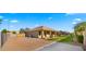Charming single-story home with a well-manicured lawn at 6602 S Constellation Way, Gilbert, AZ 85298
