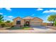 Charming single-story home with a neatly manicured lawn, offering great curb appeal and a welcoming entrance at 6602 S Constellation Way, Gilbert, AZ 85298