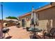 Backyard with seating, pizza oven and barbecue grill at 6631 E Rhodes St, Mesa, AZ 85215