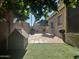 Backyard offers a perfect outdoor space with patio, grass area, and grill at 6631 E Rhodes St, Mesa, AZ 85215