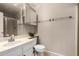 Cozy bathroom with sink, toilet, vanity and shower with glass doors at 6631 E Rhodes St, Mesa, AZ 85215