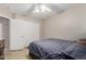 Comfortable bedroom featuring a ceiling fan, a closet, neutral walls and carpet providing a relaxing atmosphere at 6631 E Rhodes St, Mesa, AZ 85215