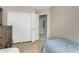 Bedroom featuring closet, dresser, neutral walls and tiled floor, perfect for a comfortable living space at 6631 E Rhodes St, Mesa, AZ 85215