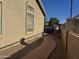 Side yard leads to backyard amenities including a BBQ and outdoor oven at 6631 E Rhodes St, Mesa, AZ 85215