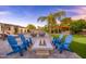 Inviting backyard with fire pit, lounge chairs, pool, and outdoor grill perfect for entertaining and relaxation at 6831 E Presidio Rd, Scottsdale, AZ 85254