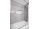 Bright bathroom featuring sleek gray subway tile shower with a convenient inset shelf at 6831 E Presidio Rd, Scottsdale, AZ 85254
