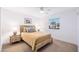 Cozy bedroom with natural light, a wood-framed bed, and a serene ambiance with street view at 6831 E Presidio Rd, Scottsdale, AZ 85254
