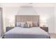 Luxurious bedroom showcasing a king-size bed with decorative pillows and elegant nightstands at 6831 E Presidio Rd, Scottsdale, AZ 85254