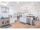 Bright, modern kitchen featuring stainless steel appliances and an open layout to the dining and living areas at 6831 E Presidio Rd, Scottsdale, AZ 85254