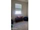 Simple bedroom with beanbag chairs and a fire truck toy at 7251 E Grouse Ct, San Tan Valley, AZ 85143