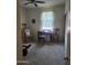 Bedroom showcasing neutral walls, carpet floors, window, and a vintage style desk at 7251 E Grouse Ct, San Tan Valley, AZ 85143