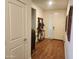 Bright entryway with hardwood floors and a coat rack with space for storage and decor at 7251 E Grouse Ct, San Tan Valley, AZ 85143