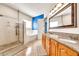 Bathroom featuring granite countertops, a soaking tub, and a glass-enclosed shower at 747 E Meadow Ln, Phoenix, AZ 85022