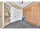 Bedroom with carpet, closet, murphy bed, and neutral paint at 747 E Meadow Ln, Phoenix, AZ 85022