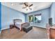 Bedroom boasting cozy carpet, ceiling fan, and great natural light at 747 E Meadow Ln, Phoenix, AZ 85022
