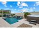 A beautifully landscaped pool and spa offer a relaxing outdoor space, perfect for entertaining and enjoying the weather at 9834 E Thatcher Ave, Mesa, AZ 85212