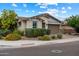 Charming single-story house with a well-maintained front yard at 9834 E Thatcher Ave, Mesa, AZ 85212