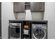 Convenient laundry room with modern washer and dryer at 9834 E Thatcher Ave, Mesa, AZ 85212