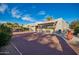 Expansive backyard featuring a covered patio perfect for entertaining, surrounded by mature landscaping and desert scenery at 988 W Crooked Stick Dr, Casa Grande, AZ 85122