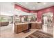 Open-concept kitchen boasts a breakfast bar, sleek appliances, and seamless integration with the living area at 988 W Crooked Stick Dr, Casa Grande, AZ 85122