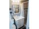 Updated bathroom with a stylish vanity, modern fixtures, and a tiled shower at 1017 W Piccadilly Rd, Phoenix, AZ 85013