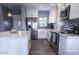 Bright kitchen features white cabinets, stainless steel appliances, and a functional layout at 1017 W Piccadilly Rd, Phoenix, AZ 85013