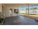 Covered back patio with a concrete floor, outdoor furniture, and a view of the yard with a trampoline at 1020 E Vermont Ave, Phoenix, AZ 85014