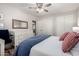 Bright bedroom features a comfortable bed, ample storage, and neutral-toned decor at 1020 E Vermont Ave, Phoenix, AZ 85014