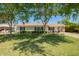 Charming single-story home with lush front yard, mature trees and inviting curb appeal at 1020 E Vermont Ave, Phoenix, AZ 85014