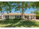 Beautiful single-level house with well-manicured lawn and appealing facade at 1020 E Vermont Ave, Phoenix, AZ 85014