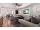 Inviting living room with abundant light, contemporary decor, and spacious layout at 1020 E Vermont Ave, Phoenix, AZ 85014