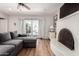 The living room features a fireplace, French doors, and a comfortable sectional sofa at 1020 E Vermont Ave, Phoenix, AZ 85014