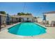 Inviting backyard pool with lounge chairs and string lights, perfect for relaxing and entertaining outdoors at 1020 E Vermont Ave, Phoenix, AZ 85014