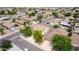 Aerial view of this neighborhood showing well-maintained homes with tile roofs and mature landscaping at 1036 E Magnum Rd, San Tan Valley, AZ 85140