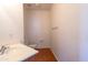 Well-lit half bathroom with a single vanity and a toilet with modern fixtures at 1036 E Magnum Rd, San Tan Valley, AZ 85140