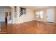 Welcoming living area with staircase, hard surface floors, and neutral walls at 1036 E Magnum Rd, San Tan Valley, AZ 85140