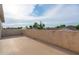 Outdoor roof deck offers stucco walls and views of the surrounding neighborhood at 1036 E Magnum Rd, San Tan Valley, AZ 85140