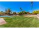 Expansive backyard with lush lawn and refreshing pool area at 1170 E Carmen St, Tempe, AZ 85283