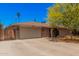 Well-maintained home featuring a two-car garage and convenient gated driveway to provide curb appeal at 1170 E Carmen St, Tempe, AZ 85283