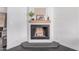 Stylish fireplace showcasing a modern design, decorative accents, and an elegant finish for a cozy feel at 1170 E Carmen St, Tempe, AZ 85283