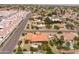 Aerial view of the community showcasing desert landscaping and terracotta roofs at 12899 W Pasadena Ave, Litchfield Park, AZ 85340