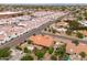 Aerial view of the community showcasing desert landscaping and terracotta roofs at 12899 W Pasadena Ave, Litchfield Park, AZ 85340
