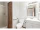 Bathroom with light vanity, toilet, and shower at 12899 W Pasadena Ave, Litchfield Park, AZ 85340