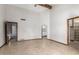 Open bedroom with attached bathroom and walk-in closet offers plenty of room and tile floors at 12899 W Pasadena Ave, Litchfield Park, AZ 85340