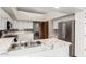 Modern kitchen featuring stainless steel refrigerator and open layout at 12899 W Pasadena Ave, Litchfield Park, AZ 85340