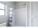 Bright shower featuring tile and modern shower head fixture at 12899 W Pasadena Ave, Litchfield Park, AZ 85340