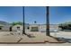 Charming single-story home featuring a two-car garage, desert landscaping, and inviting front entry at 1423 W Joan De Arc Ave, Phoenix, AZ 85029
